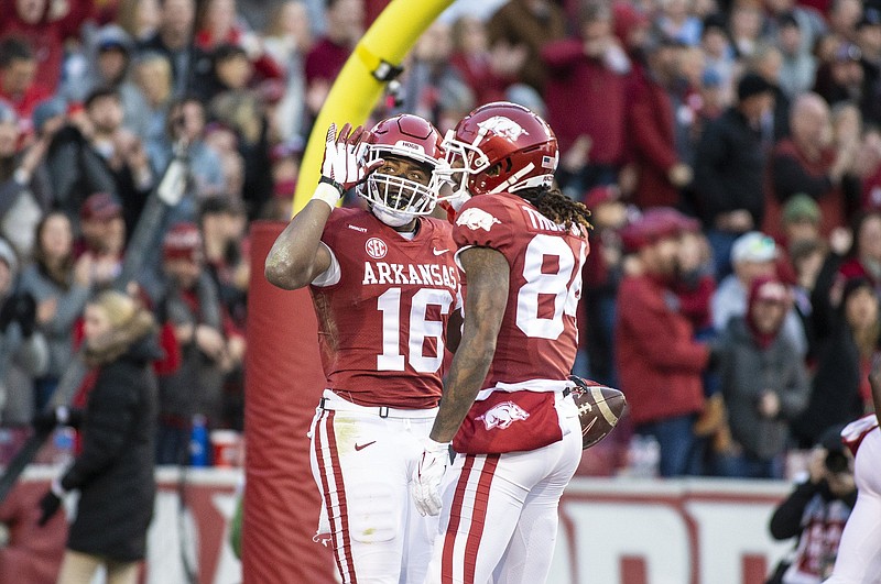  Arkansas Wide receiver Treylon Burks (16) celebrates touchdown in 3rd quarter on Friday, Nov. 26 2021, during the second half of play at Reynolds Razorback Stadium, Fayetteville. Visit nwaonline.com/211027Daily/ for today's photo gallery..(Special to the NWA Democrat-Gazette/David Beach)