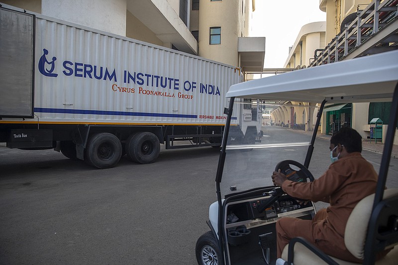 A container truck carrying a consignment of vaccines for Nepal is seen Monday at Serum Institute of India. The company is the world’s largest vaccine maker and resumed exports of coronavirus vaccines to the U.N.-backed covax distribution program on Friday.
(AP/Rafiq Maqbool)