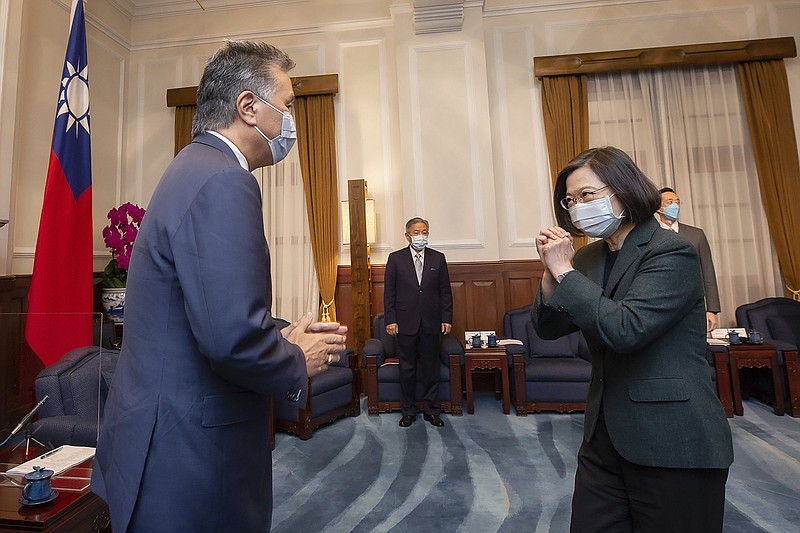 U.S. Rep. Mark Takano, D-Calif., (left) is greeted by Taiwanese President Tsai Ing-wen on Friday at the Presidential Office in Taipei, Taiwan.
(AP/Taiwan Presidential Office)