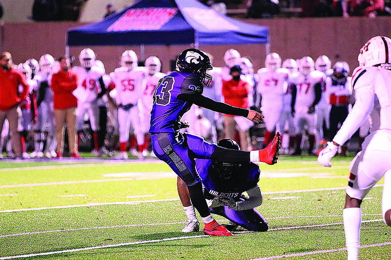 El Dorado kicker Rojemi Aydogdu follows through on a field goal against Marion on Friday. The senior foreign exchange student from Germany has played a major role in the Wildcats' season. El Dorado will face Greenwood on Saturday in the 6A state championship game, beginning at noon in War Memorial Stadium.