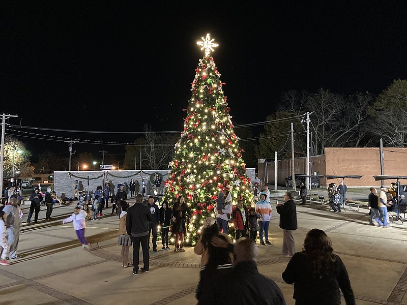 The city's Christmas tree, located in the downtown plaza at Main Street and Sixth Avenue, was illuminated Sunday, Nov. 28, 2021. (Pine Bluff Commercial/Byron Tate)