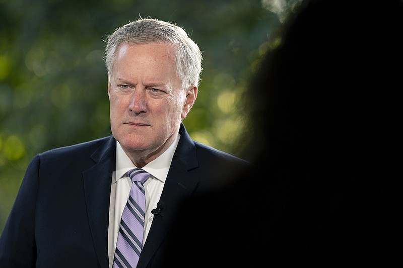 FILE — Mark Meadows, then the White House chief of staff under President Donald Trump, speaks during a television interview outside the White House in Washington on Sept. 22, 2020. Meadows has turned over documents and agreed to be deposed by the House committee investigating the Jan. 6 attack on the Capitol, the panel said on Tuesday, Nov. 30, 2021. (Stefani Reynolds/The New York Times)