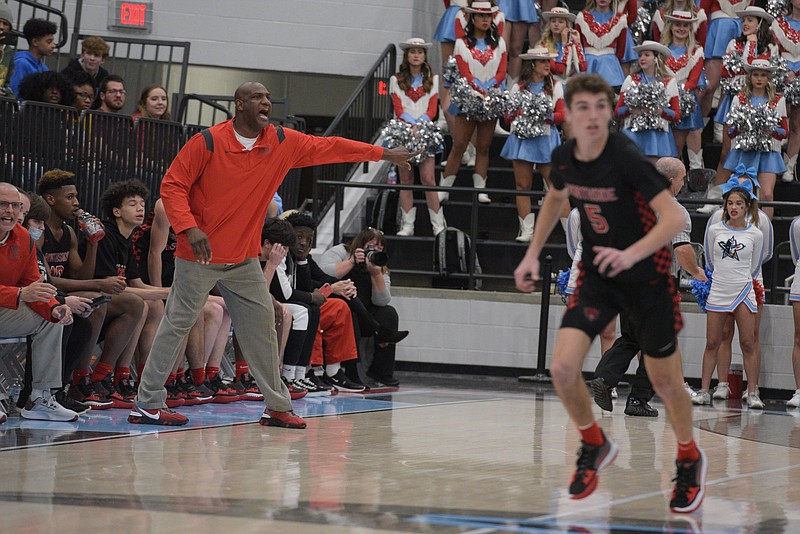 Eric Burnett (left), head coach of Fort Smith Northside, reacts on Tuesday, Nov. 30, 2021, during the first quarter of a basketball game against Southside inside Southside Arena in Fort Smith. Go to nwaonline.com/211201Daily/ to see more photos..(NWA Democrat-Gazette/Hank Layton)