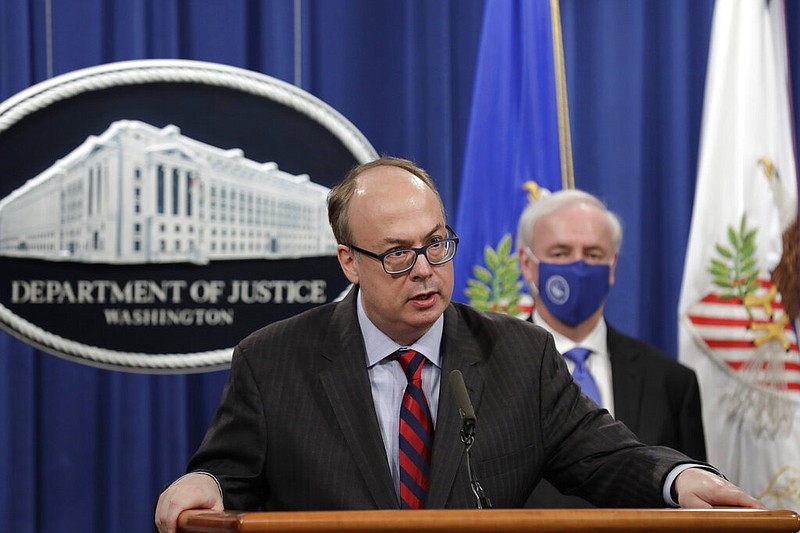 FILE - Acting Assistant U.S. Attorney General Jeffrey Clark speaks as he stands next to Deputy Attorney General Jeffrey A. Rosen during a news conference at the Justice Department in Washington, Oct. 21, 2020. (Yuri Gripas/Pool via AP, File)