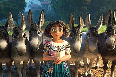 Mirabel (voice of Stephanie Beatriz) is surrounded by a bunch of wide-eyed donkeys in this scene from “Encanto,” which came in at No. 1 last weekend with about $40.3 million at U.S. theaters.