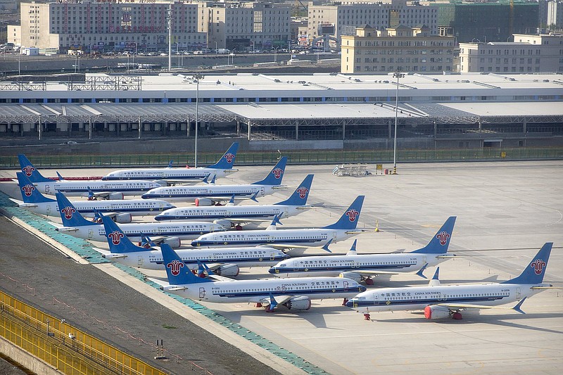 China Southern Airlines Boeing 737 Max airplanes are parked at the edge of the tarmac at Urumqi Diwopu International Airport in Urumqi in western China’s Xinjiang Uyghur Autonomous Region in April. China’s aviation regulator cleared the Boeing 737 Max on Thursday to return to flying with technical upgrades more than two years after the plane was grounded worldwide.
(AP/Mark Schiefelbein)