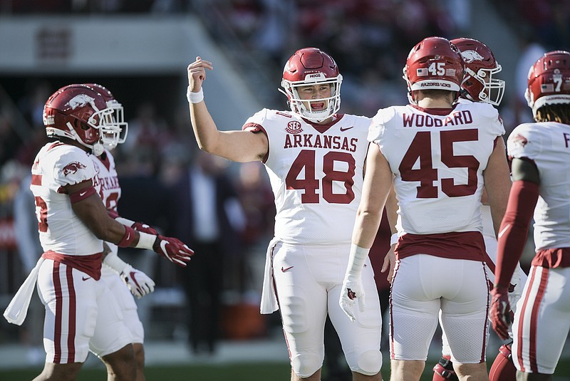 FILE -- Arkansas long snapper Jordan Silver (48) gathers players, Saturday, November 20, 2021 before a football game at Bryant-Denny Stadium in Tuscaloosa, Ala. (NWA Democrat-Gazette/Charlie Kaijo)