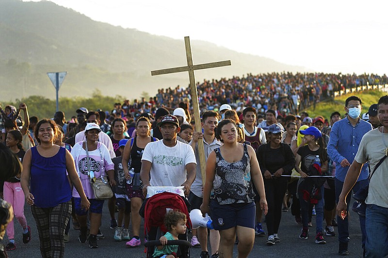 FILE - Migrants leave Huixtla, Chiapas state, Mexico, Oct. 27, 2021, as they continue their trek north toward Mexico's northern states and the U.S. border. (AP/Marco Ugarte, file)