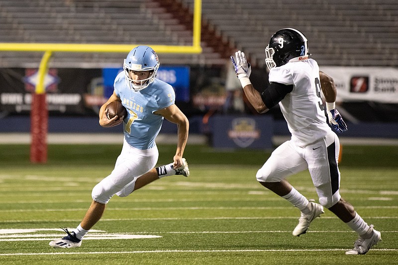 Quarterback Charlie Fiser (left) passed for 386 yards and 3 touchdowns for Pulaski Academy and also rushed for 2 scores during Friday night’s game.
(Arkansas Democrat-Gazette/Justin Cunningham)