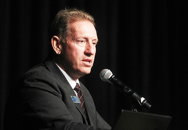 Tony Prothro, executive director of the Arkansas School Boards Association, reviews the Arkansas Legislature's 2017 session during the Southern Region Leadership Conference closing general session in Horner Hall of the Hot Springs Convention Center in this July 2017 file photo. (Special to the Arkansas Democrat-Gazette/Richard Rasmussen)