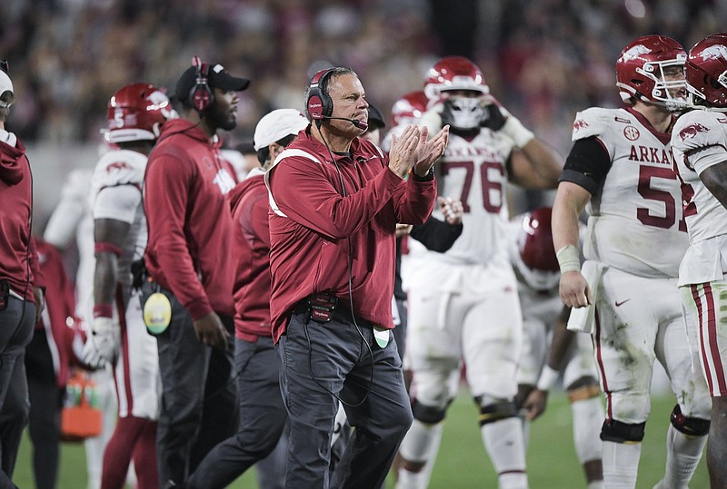 Arkansas head coach Sam Pittman reacts after defensive back Montaric Brown (21) recovered a fumble, Saturday, November 20, 2021 during the third quarter of a football game at Bryant-Denny Stadium in Tuscaloosa, Ala. Check out nwaonline.com/211121Daily/ for today's photo gallery. .(NWA Democrat-Gazette/Charlie Kaijo)