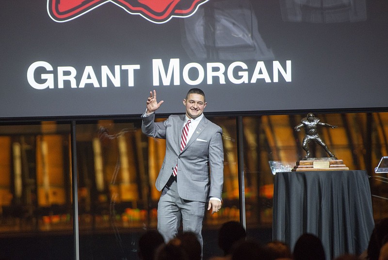 Arkansas? Grant Morgan takes the stage during the Burlsworth Trophy Ceremony Monday Dec. 6, 2021 at Crystal Bridges Museum of American Art in Bentonville. For more information about the award see http://burlsworthtrophy.com/  Visit nwaonline.com/211207Daily/  (NWA Democrat-Gazette/J.T. Wampler)