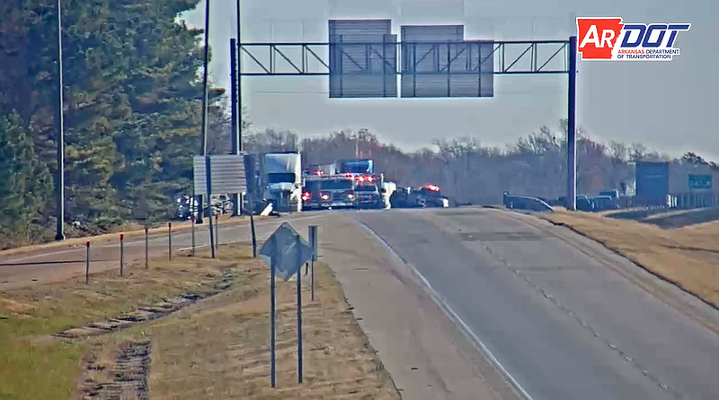 The scene of an injury crash and chemical spill on Interstate 40 on Tuesday is shown in this screen capture of video provided by the Arkansas Department of Transportation.