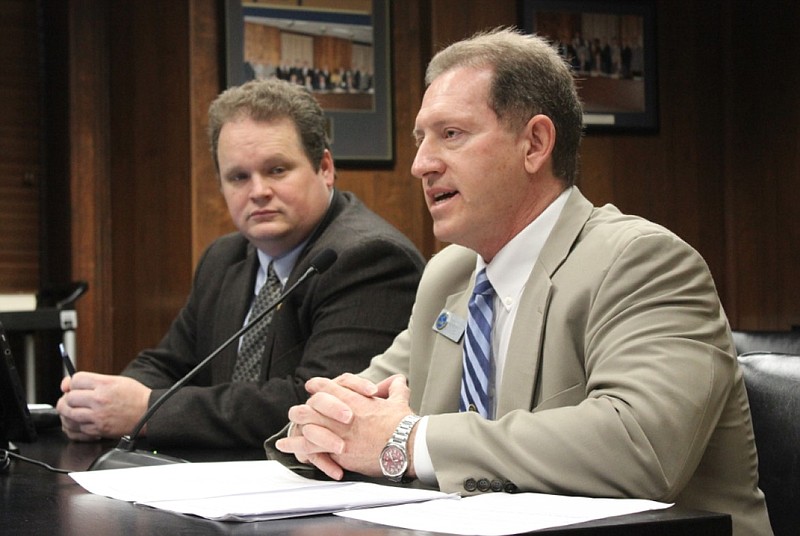 Tony Prothro (foreground), executive director of the Arkansas School Boards Association, is shown in this March 26, 2015, file photo. At left is then-state Rep. Nate Bell of Mena. (Arkansas Democrat-Gazette file photo)