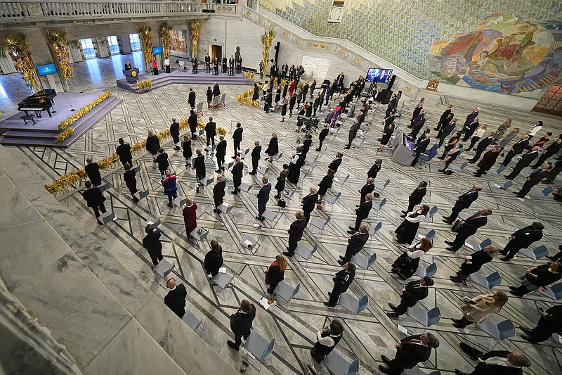 A minute of silence is observed Friday in memory of slain journalists during the Nobel Peace Prize ceremony at Oslo City Hall in Norway.
(AP/Alexander Zemlianichenko)