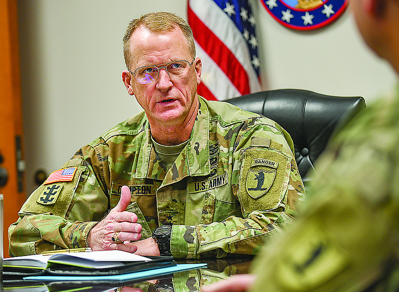 Maj. Gen. Levon Cumpton, Adjutant General of the MIssouri National Guard, is shown at a conference table as he talks to staff about upcoming events and reviewing previous ones.  Cumpton has served at AG since August of 2019, being formally pinned from one star to two star in October of 2019.