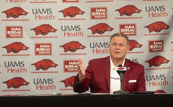 Arkansas coach Sam Pittman speaks to reporters during a news conference Wednesday, Dec. 15, 2021, in Fayetteville.