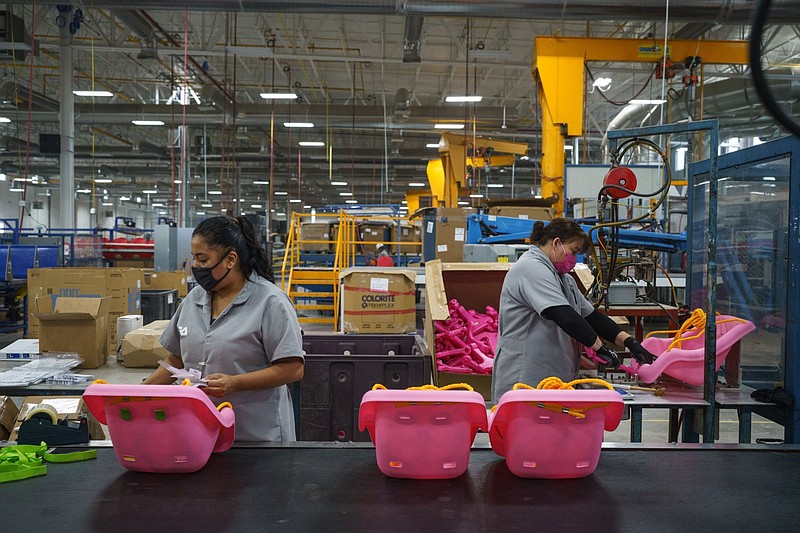 MGA workers put together Little Tikes toys at the company’s new plant in Juarez, Mexico.
(Bloomberg (WPNS)/Paul Ratje)
