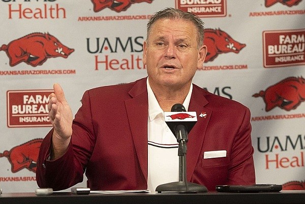 Arkansas coach Sam Pittman speaks to reporters on Wednesday, Dec. 15, 2021, the first day of the early signing period.
