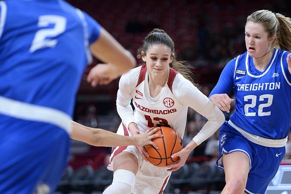 Arkansas guard Sasha Goforth dribbles into the lane on Tuesday, Dec. 21, 2021, against Creighton during the second half of the Razorbacks’ 81-72 loss in Bud Walton Arena in Fayetteville.