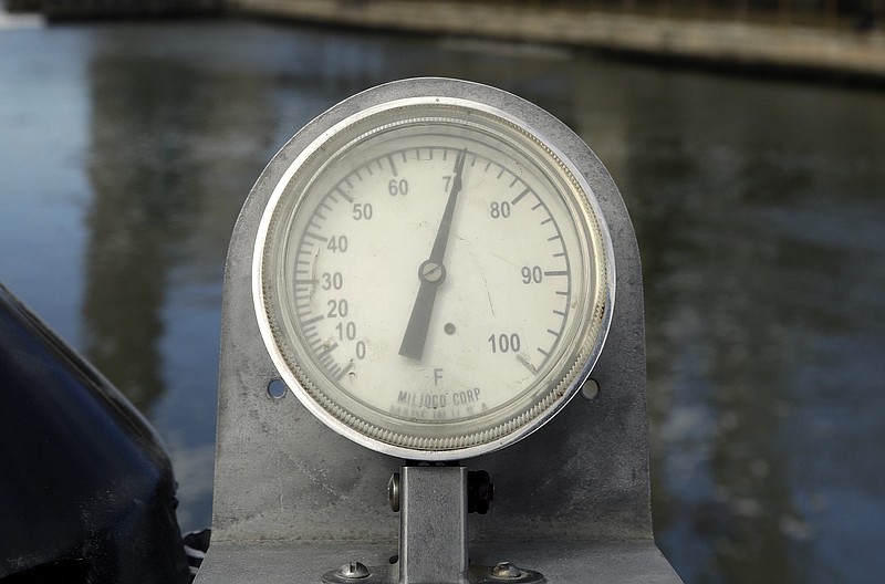 An outdoor thermometer shows a temperature of 70 degrees Fahrenheit in this undated file photo. (AP/Chris O'Meara)