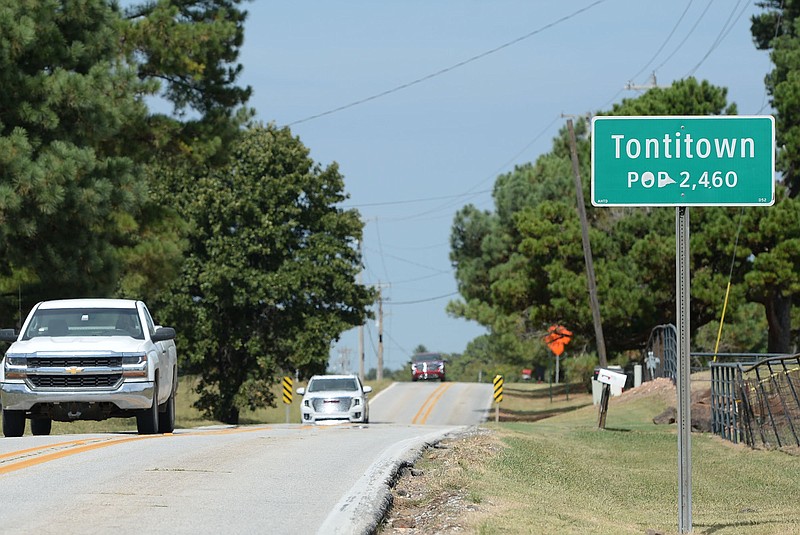 Traffic passes Friday, Sept. 24, 2021, along Arkansas 112 in Tontitown. (NWA Democrat-Gazette/Andy Shupe)