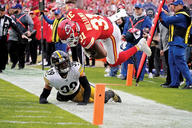 Chiefs running back Darrel Williams is knocked out of bounds by Steelers free safety Minkah Fitzpatrick during Sunday’s game at Arrowhead Stadium. (Associated Press)