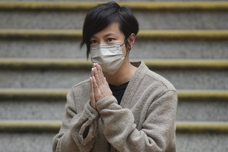 Hong Kong activist and music star Denise Ho bows to well-wishers as she is released from Western Police Station after more than 24 hours in custody Thursday. Hong Kong police arrested her Wednesday in relation to colonial-era charges of sedition, because she was connected to Stand News, which closed Wednesday after police raided its office and arrested its senior staff.
(AP/Vincent Yu)