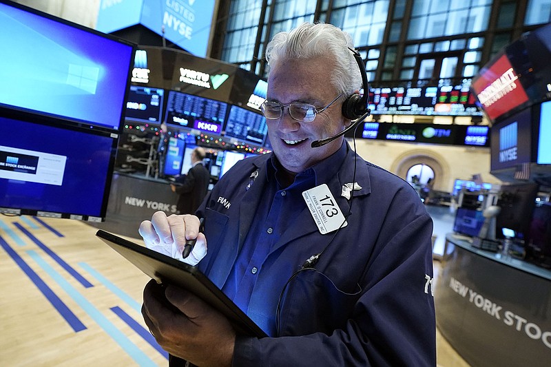 Trader Frank O’Connell works on the floor of the New York Stock Exchange on Dec. 1, a day when stocks, oil and bond yields recovered some of their sharp losses from the day before. Throughout 2021, markets continued to exhibit the strength they have shown throughout much of the pandemic.
(AP/Richard Drew)