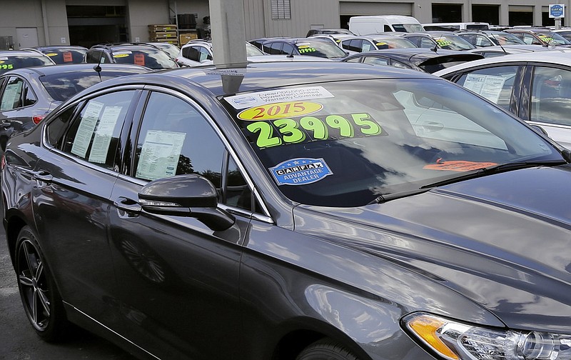 A certified used car is shown for sale in a car lot in this Nov. 3, 2015, file photo. (AP/Chris O'Meara)