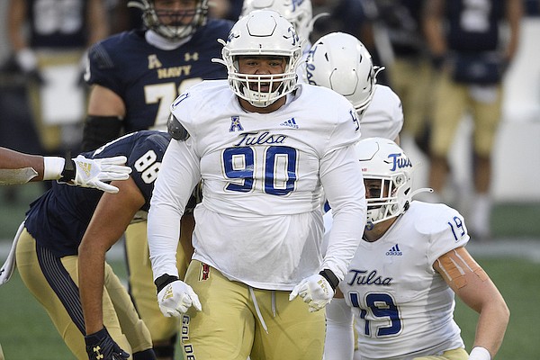 Tulsa defensive lineman Jaxon Player (90) during the first half of an NCAA college football game against Navy, Saturday, Dec. 5, 2020, in Annapolis, Md. (AP Photo/Nick Wass)