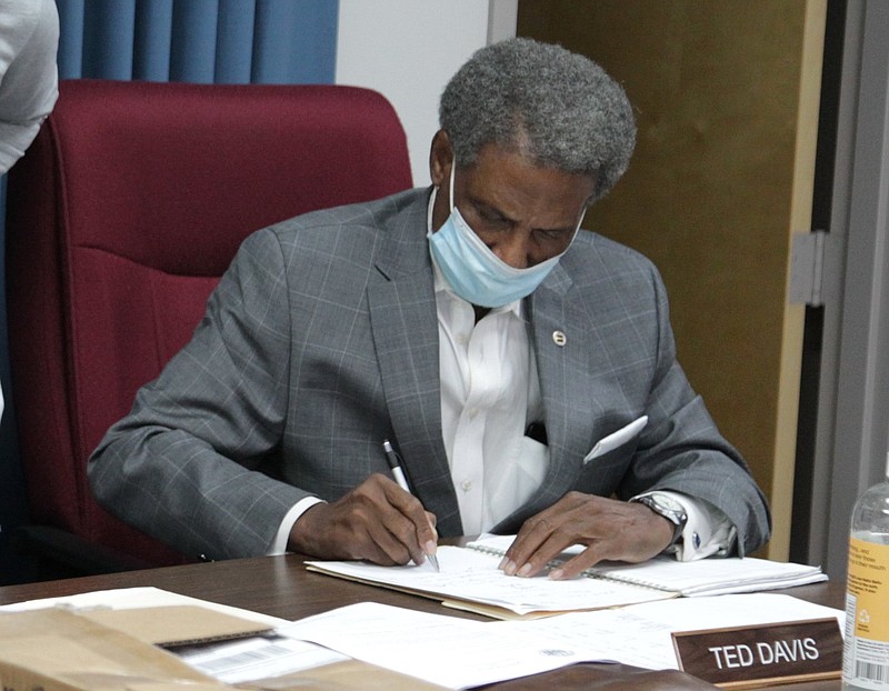 Jefferson County Election Commission member Ted Davis examines ballots for the November 2020 general election in Jefferson County in this Nov. 13, 2020, file photo. (Pine Bluff Commercial/Dale Ellis)