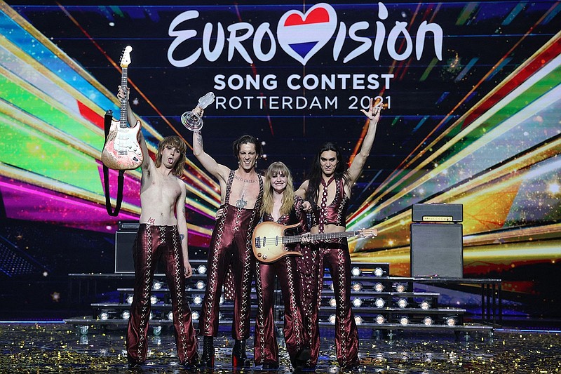 Italy’s Maneskin pose for pictures on stage May 22 with the trophy after winning the final of the 65th edition of the Eurovision Song Contest, at the Ahoy convention center in Rotterdam, Netherlands. The contest helped propel them to the United States, which has fallen for them. (AFP via Getty Images/TNS/Kenzo Tribouillard)