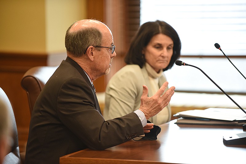 University of Arkansas System President Donald Bobbitt and Gina Terry, chief financial officer for the system, answer questions Thursday in a meeting of the Legislative Joint Auditing Committee at the state Capitol. More photos at arkansasonline.com/17auditing/.
(Arkansas Democrat-Gazette/Staci Vandagriff)
