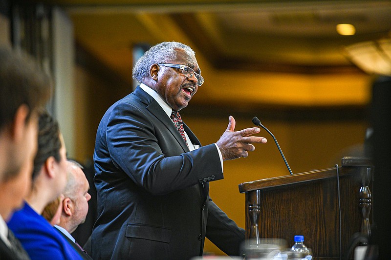 Pastor John Modest Miles delivers an energizing speech Thursday during the annual Governor's Prayer Breakfast at Capitol Plaza Hotel. Miles serves as pastor of the Morning Star Baptist Church in Kansas City. (Julie Smith/News Tribune)