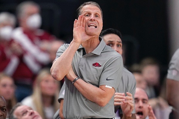 Arkansas head coach Eric Musselman yells to his team to setup a play against Texas A&M during the first half of an NCAA college basketball game Saturday, Jan. 8, 2022, in College Station, Texas. (AP Photo/Sam Craft) Arkansas head coach Eric Musselman yells to his team to setup a play against Texas A&M during the first half of an NCAA college basketball game Saturday, Jan. 8, 2022, in College Station, Texas. (AP Photo/Sam Craft)