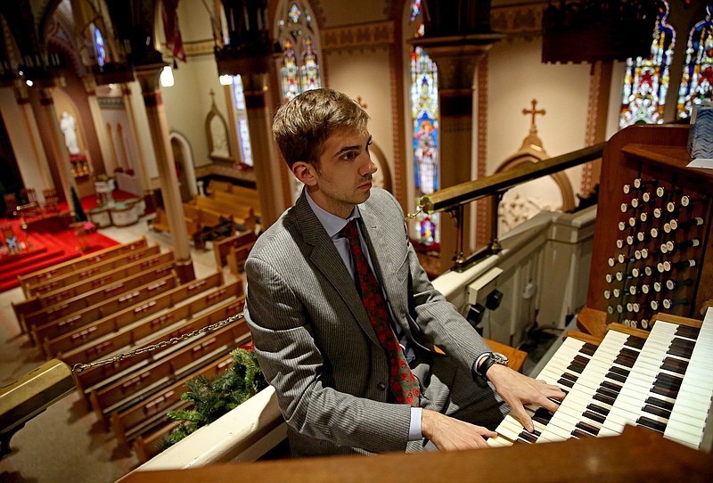 Colin MacKnight plays the organ at St. Andrew's Cathedral in downtown Little Rock on Tuesday, Jan. 4, 2022. (Arkansas Democrat-Gazette/Colin Murphey)