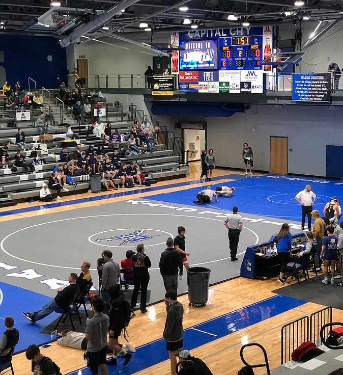 At Capital City High School, wrestlers get set for the duals tournament title match Jan. 8, 2022, between the Cavaliers and Jefferson City Jays. (Tom Rackers/News Tribune photo)
.