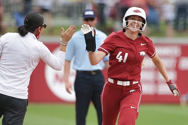 Arkansas infielder Danielle Gibson (41) runs home for a score on Saturday, May 22, 2021 during the NCAA Fayetteville Softball Regional at Bogle Park in Fayetteville. Check out nwaonline.com/210523Daily/ for the photo gallery.