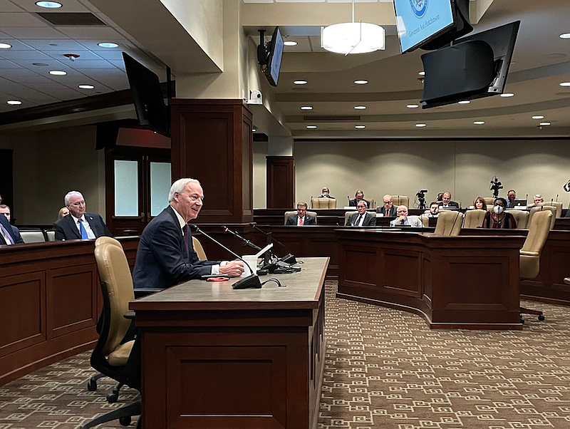 Arkansas Gov. Asa Hutchinson presents his proposed $6.04 billion budget for fiscal 2023 to the legislature's Joint Budget Committee in Little Rock on Tuesday. (Arkansas Democrat-Gazette/Tommy Metthe)