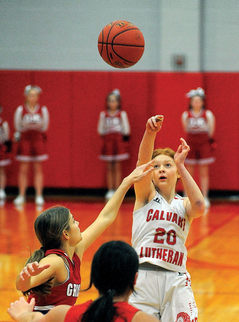 Maddy Sprengel of Calvary Lutheran puts up a shot during Monday night’s game against Sedalia Sacred Heart at Calvary Lutheran. (Shaun Zimmerman/News Tribune)