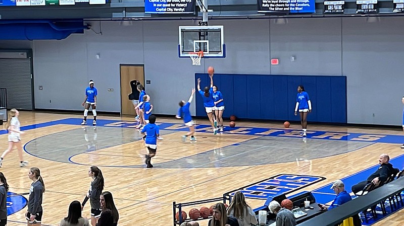 The Capital City Lady Cavaliers warm up on their home court, where they take on the Centralia Panthers in non-conference girls basketball action on Tuesday, Jan. 11, 2022. (Kyle McAreavy/News Tribune photo)