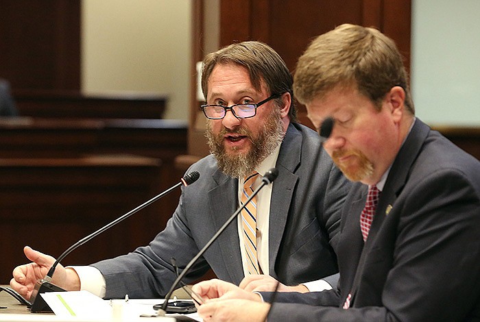 Greg Rogers, assistant commissioner of Fiscal and Administrative Services for the Arkansas Department of Education, answers a question Thursday as Secretary of Education Johnny Key listens during Joint Budget Committee budget hearings at the state Capitol. More photos at www.arkansasonline.com/114budget/.
(Arkansas Democrat-Gazette/Thomas Metthe)