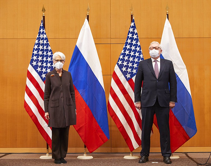 U.S. Deputy Secretary of State Wendy Sherman, left, and Russian deputy foreign minister Sergei Ryabkov attend security talks at the United States Mission in Geneva, Switzerland, Monday, Jan. 10, 2022. (Denis Balibouse/Pool via AP)
