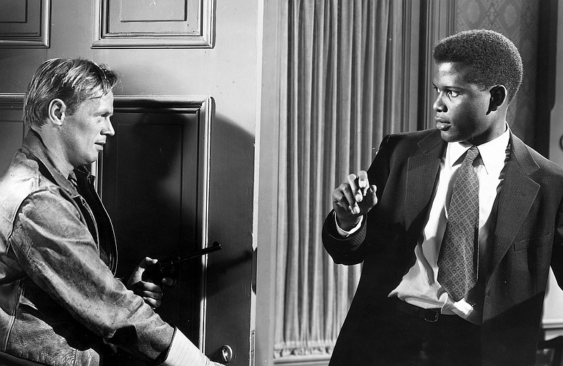 Escaped prisoner Ray Biddle (Richard Widmark) menaces Sidney Poitier’s deeply decent Dr. Luther Brooks in Poitier’s film debut, Joseph Mankiewicz’s “No Way Out” (1950).