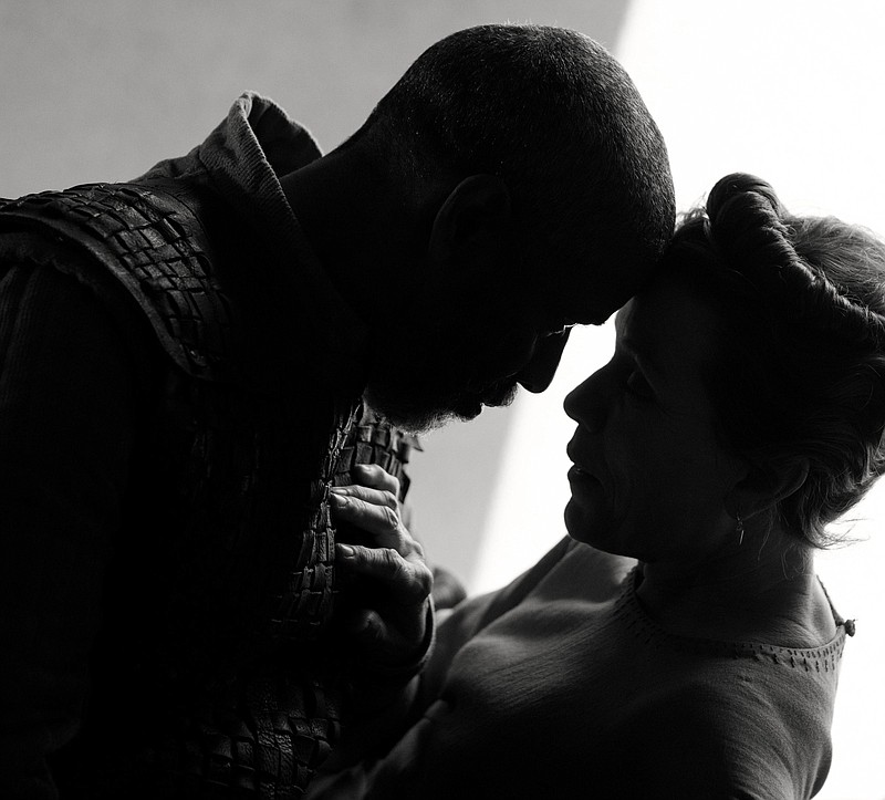 Macbeth (Denzel Washington), Thane of Glamis and Cawdor, a general in the King’s army, consults with Lady Macbeth (Frances McDormand) in “The Tragedy of Macbeth,” Joel Coen’s black-and-white re-telling of the Shakespeare play.