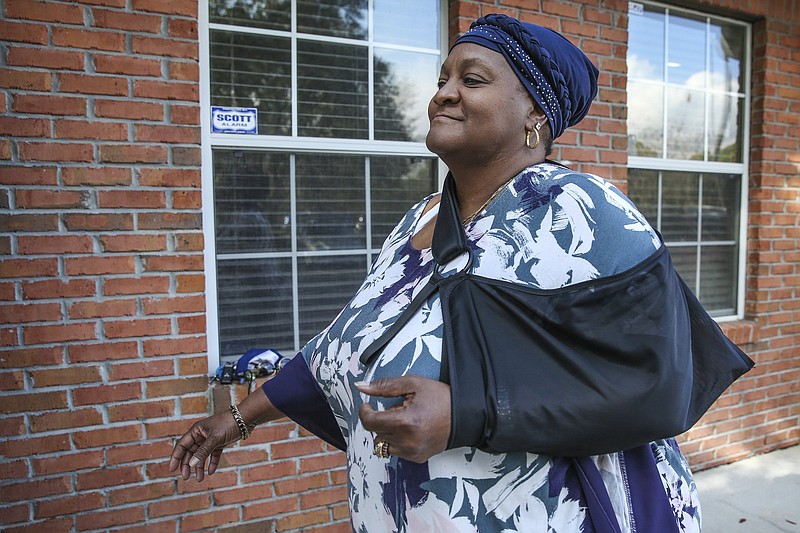 Vanessa Akinniyi poses in front of her doctor’s office Thursday in Jacksonville, Fla. Akinniyi denied she had diabetes until a care manager from her health insurer talked to her about potential problems she could run into like vision loss.
(AP/Gary McCullough)