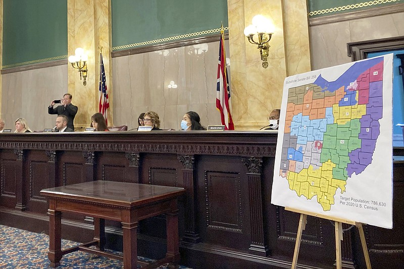 Members of the Ohio Senate Government Oversight Committee hear testimony on a new map of state congressional districts in this photo from Nov. 16, at the Ohio Statehouse in Columbus, Ohio. On Friday, the Ohio Supreme Court rejected a new map of the state’s 15 congressional districts as gerrymandered, sending the blueprint back for another try.
(AP/Julie Carr Smyth)