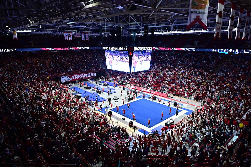 A school-record crowd of 10,345 people watched the Arkansas gymnastics team take on Auburn on Friday in the program’s first meet at Walton Arena in Fayetteville. Auburn edged Arkansas 197.25 to 197.2.
(University of Arkansas/Walt Beazley)