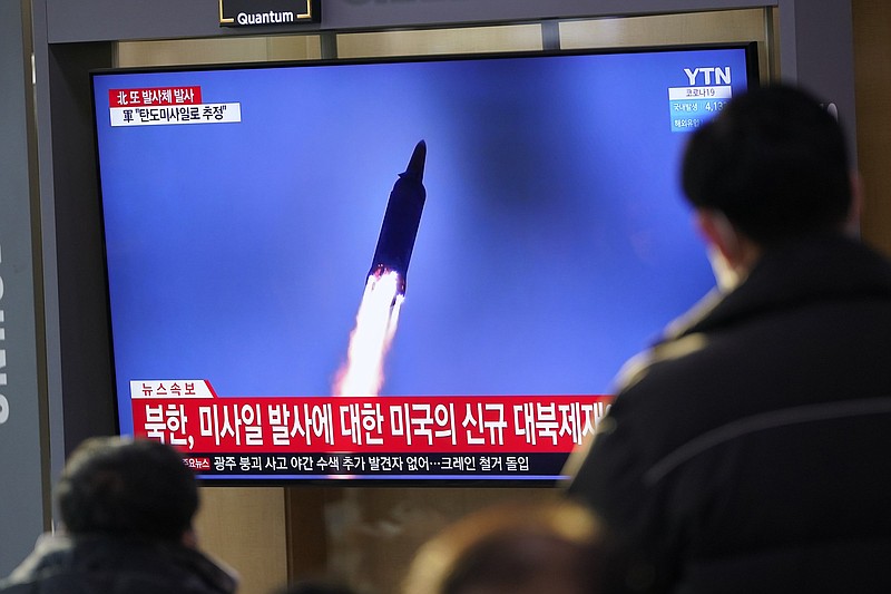 People at a train station in Seoul, South Korea, watch a TV screen showing a news program reporting about North Korea’s missile launch Friday.
(AP/Lee Jin-man)